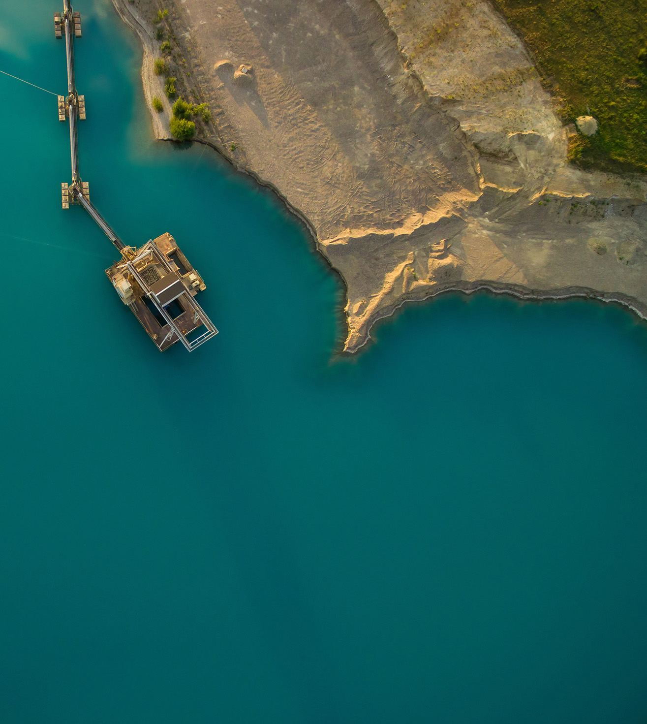 Aerial view of a construction site on the water close to the shore
